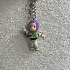 D23 exclusive Precious Moments keychain
